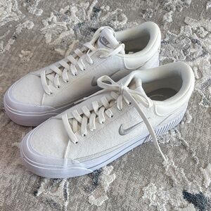 Nike Canvas Sneakers in White with Grey Swoosh. Brand new/never worn